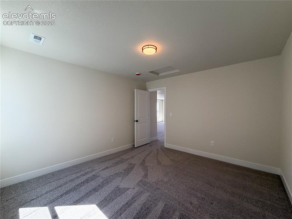 Image 19 of 26: Bedroom