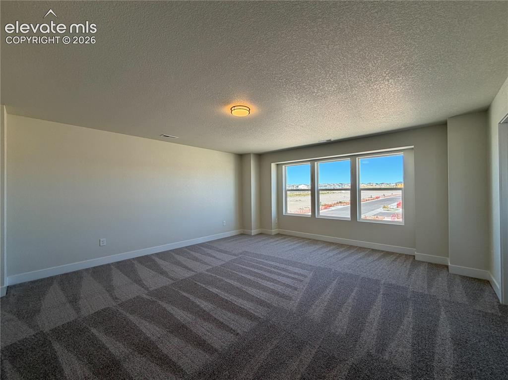 Image 21 of 26: Master Bedroom