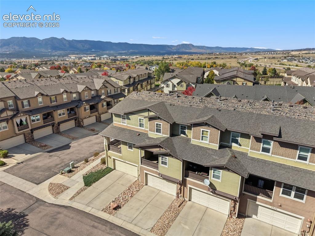 Image 8 of 44: Newly constructed townhome community featuring modern architectural design 