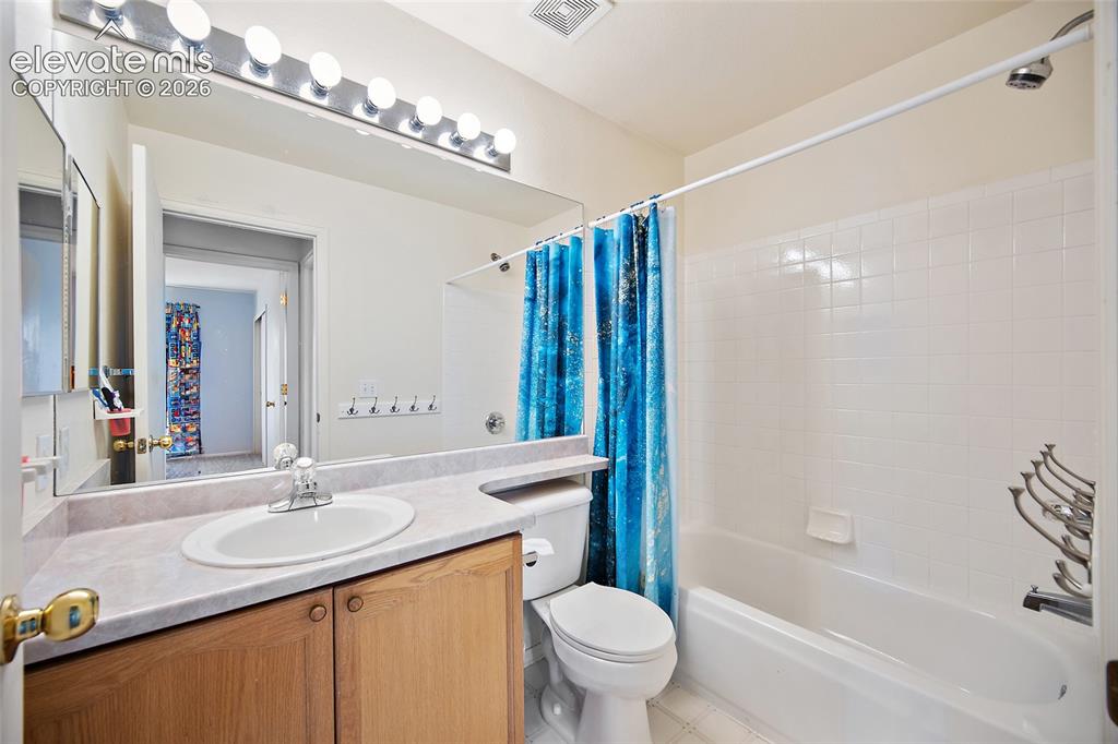 Image 30 of 45: Upper level bathroom