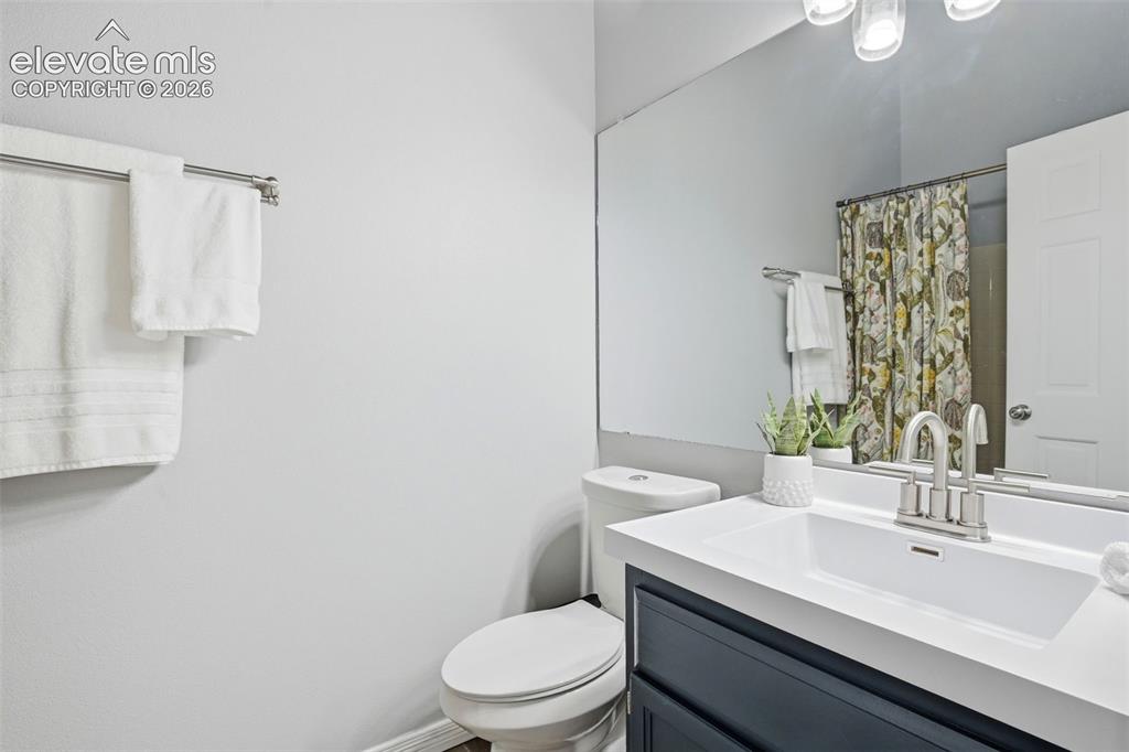 Image 21 of 49: Private full bath in the primary bedroom.