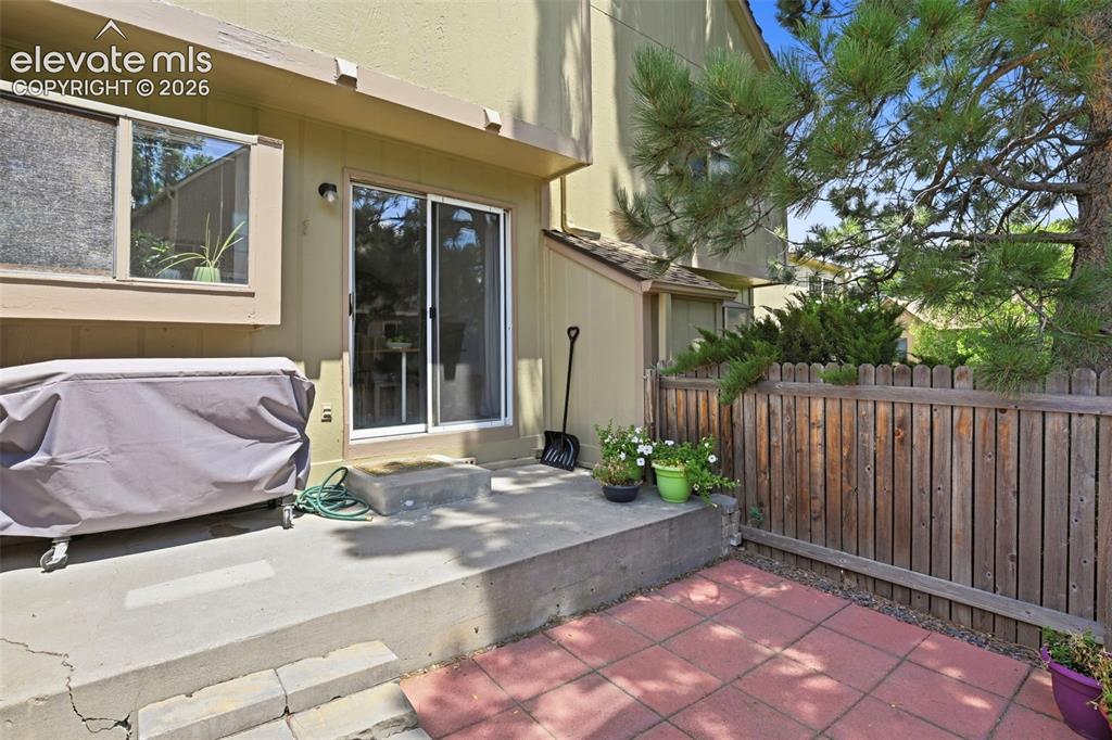 Image 30 of 49: Enjoy grilling and entertaining on the private back patio.