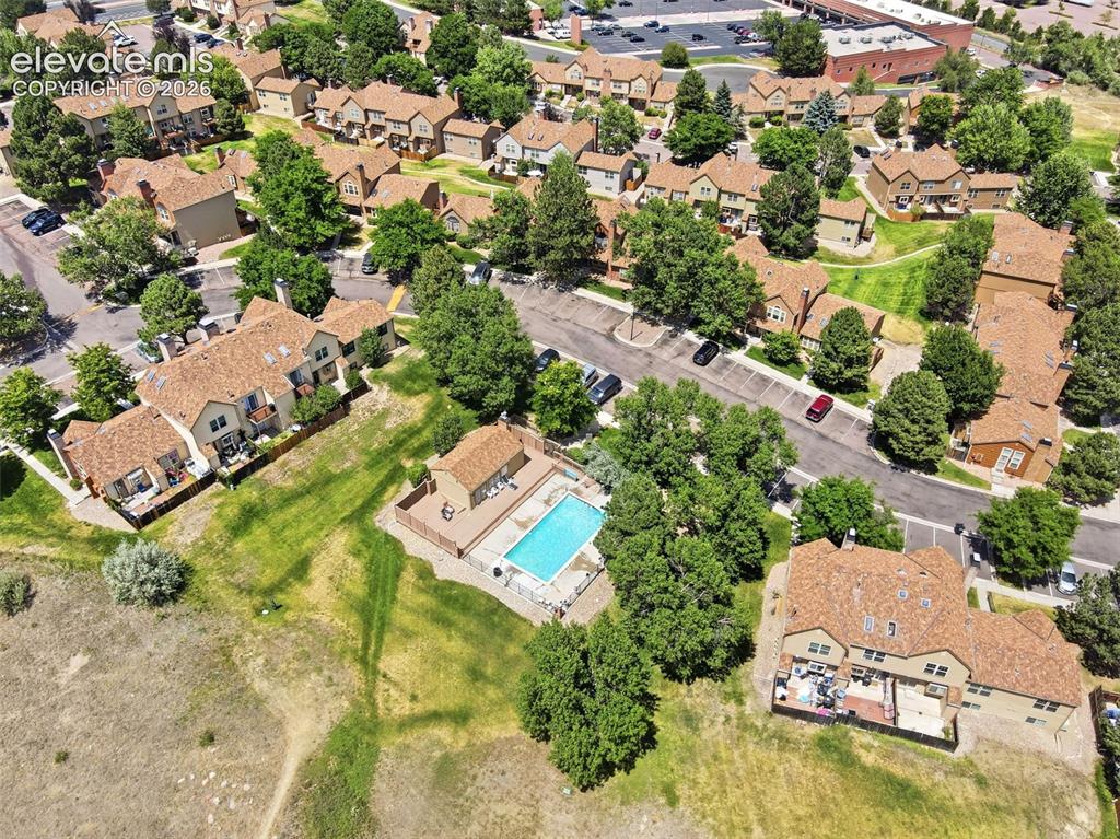 Image 37 of 49: Aerial view of community and pool
