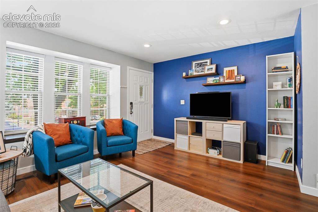 Image 8 of 49: Living room welcomes you home!