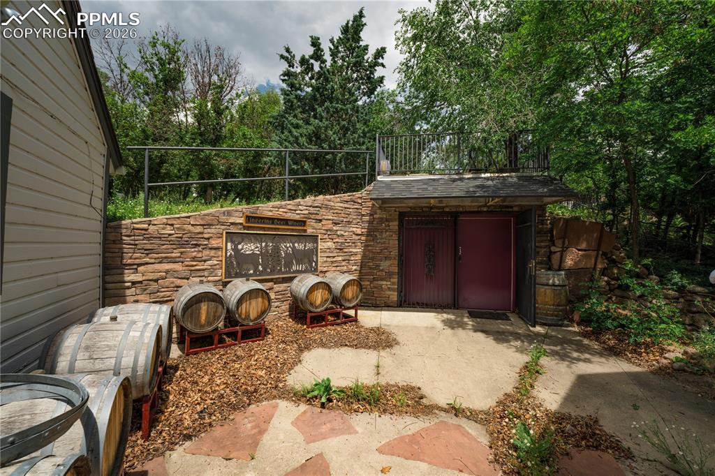 Image 30 of 50: Wine cellar area located in the backyard which was once utilized to both pr