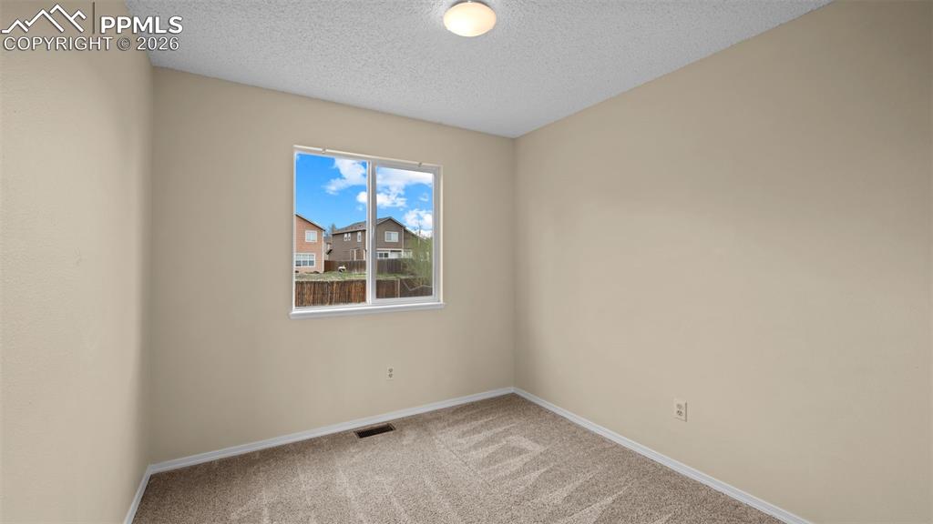 Image 14 of 36: Bedroom