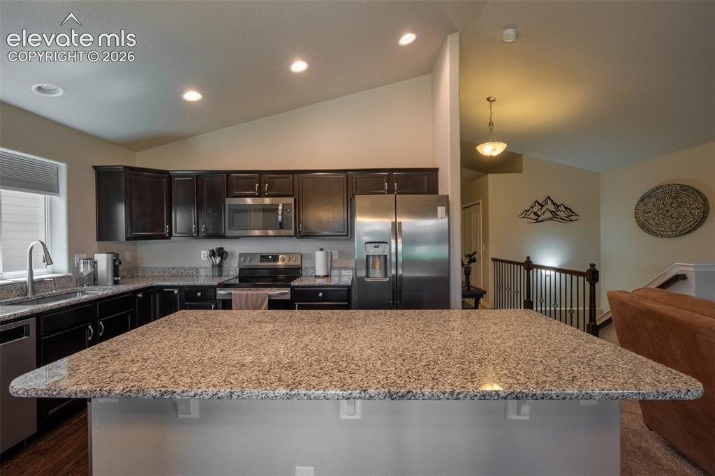 Image 10 of 42: Kitchen/living room - main floor