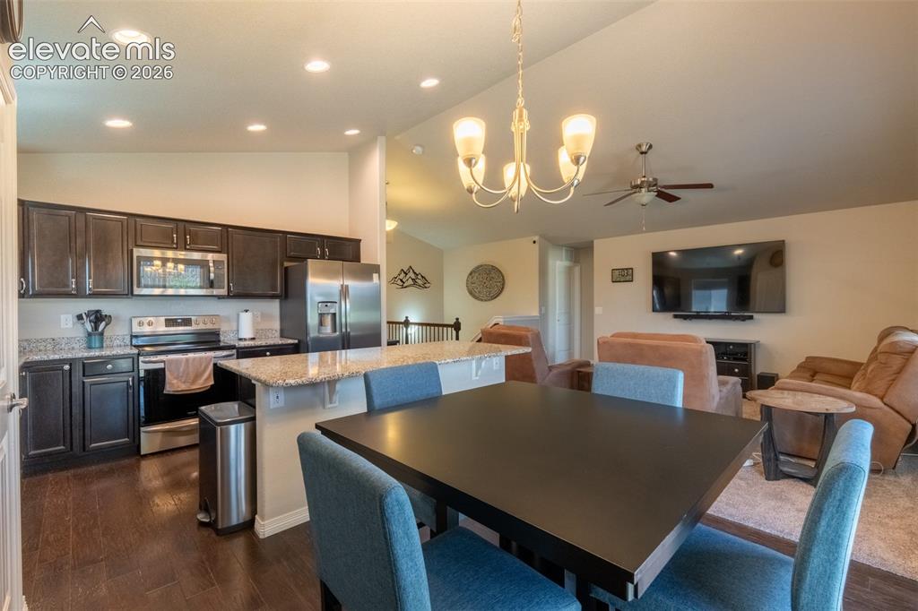 Image 11 of 42: Dining area/kitchen/living room - main floor