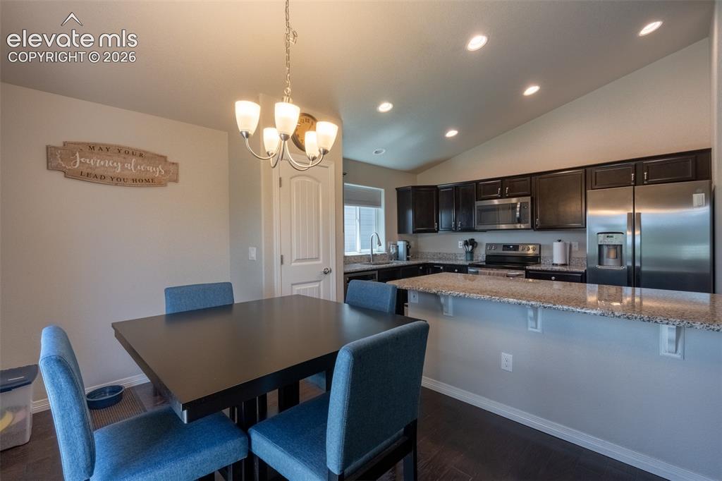 Image 12 of 42: Dining area/kitchen - main floor