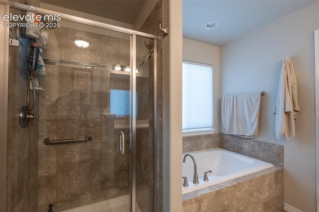 Image 19 of 42: Primary bathroom (full)- main floor