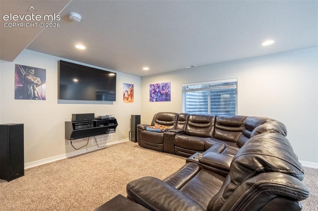 Image 25 of 42: Second living room - basement