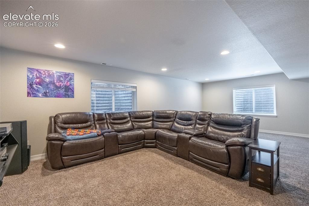Image 27 of 42: Second living room - basement