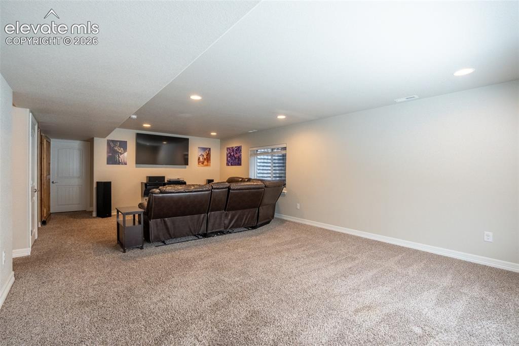 Image 28 of 42: Second living room - basement