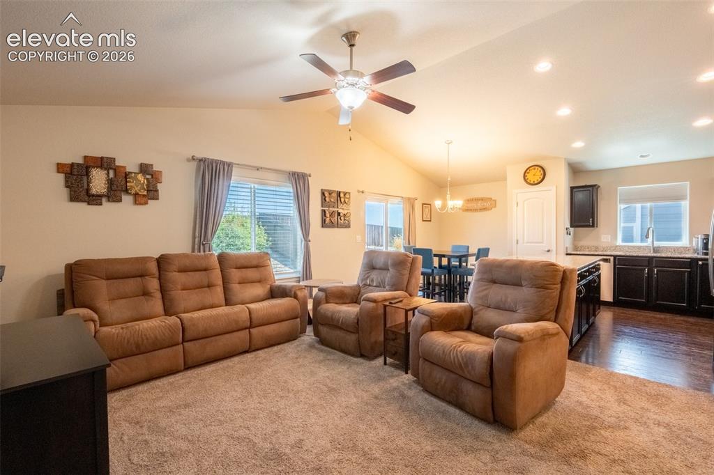 Image 6 of 42: Living room/kitchen/dining area - main floor