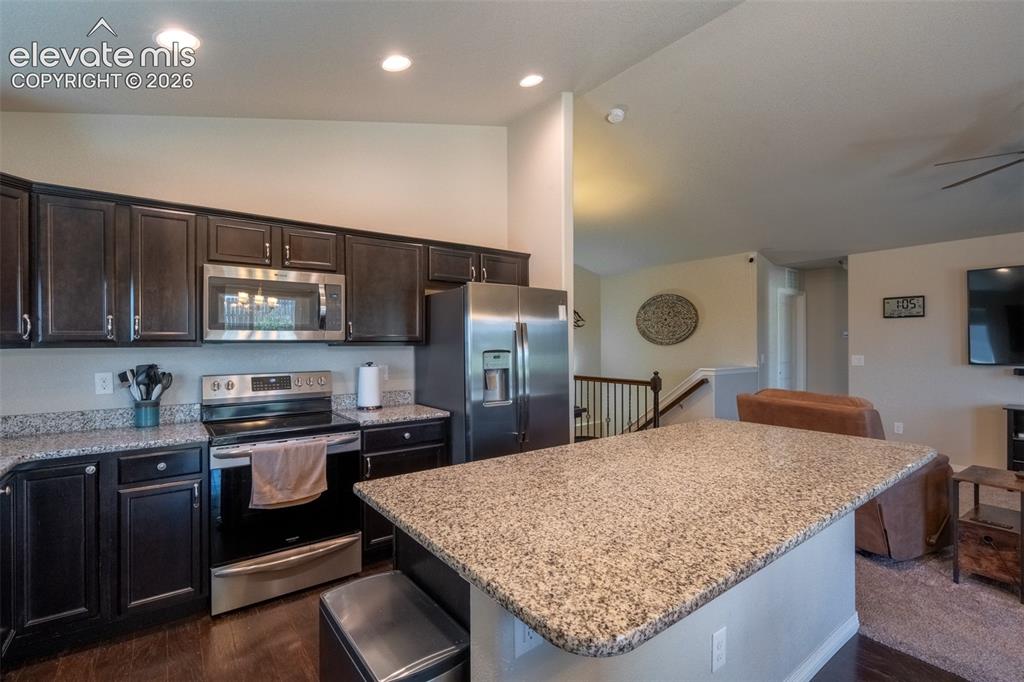 Image 9 of 42: Kitchen/living room - main floor