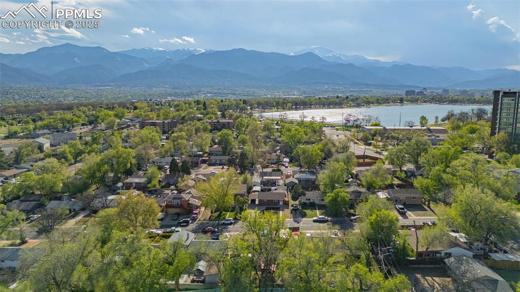 Image 23 of 30: View of property location featuring a water and mountain view and nearby su