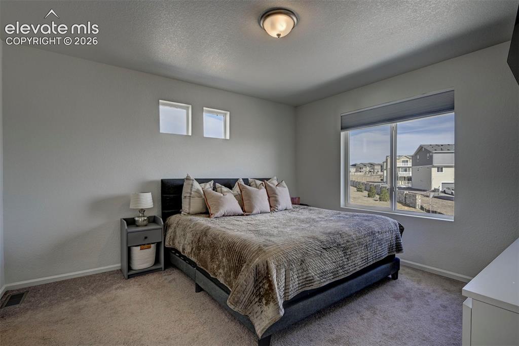 Image 9 of 21: Bedroom