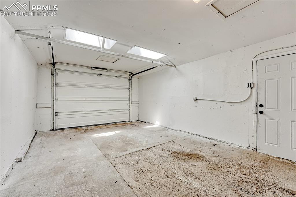 Image 21 of 29: Large and bright 1-car garage facing front. 