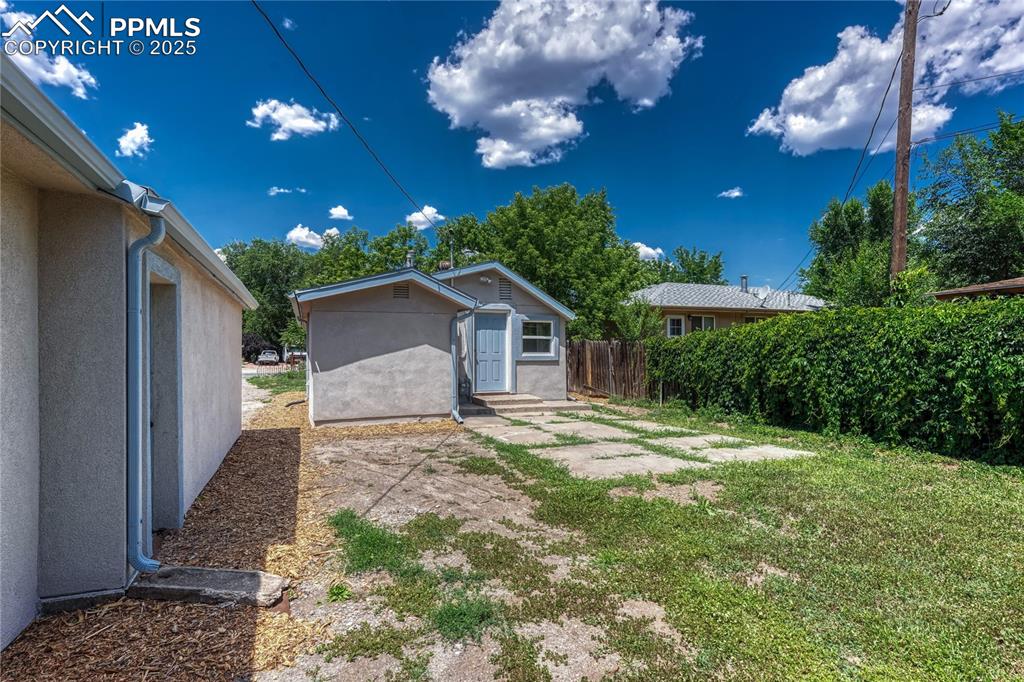 Image 26 of 29: View of yard featuring a shed