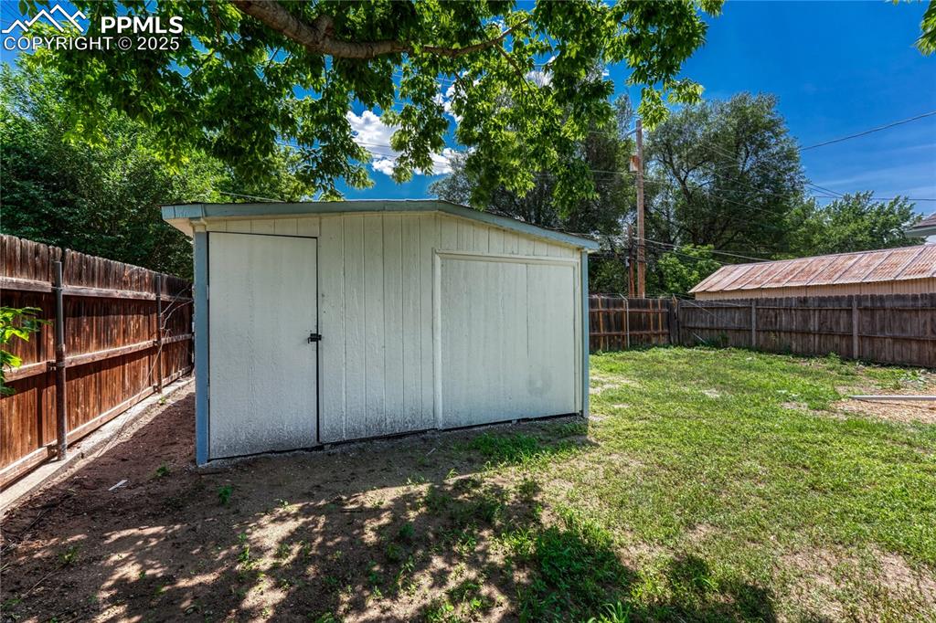 Image 28 of 29: Large storage shed and with power. 