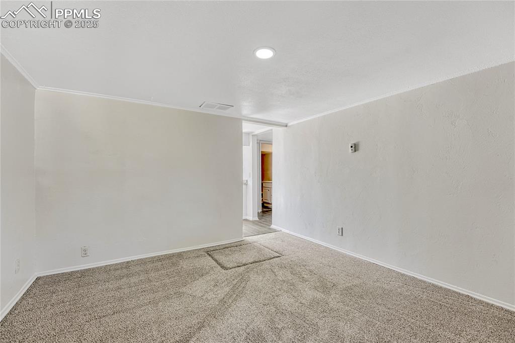 Image 6 of 29: Unfurnished room featuring carpet flooring and recessed lighting