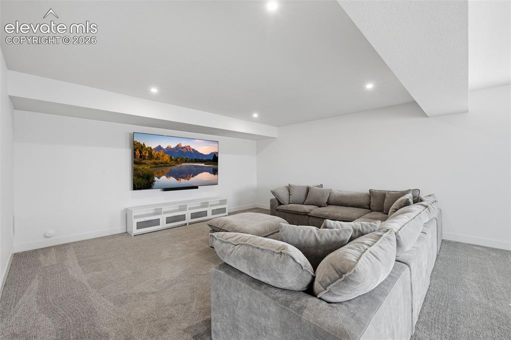 Image 28 of 44: basement with 9 foot ceilings, walkout to yard