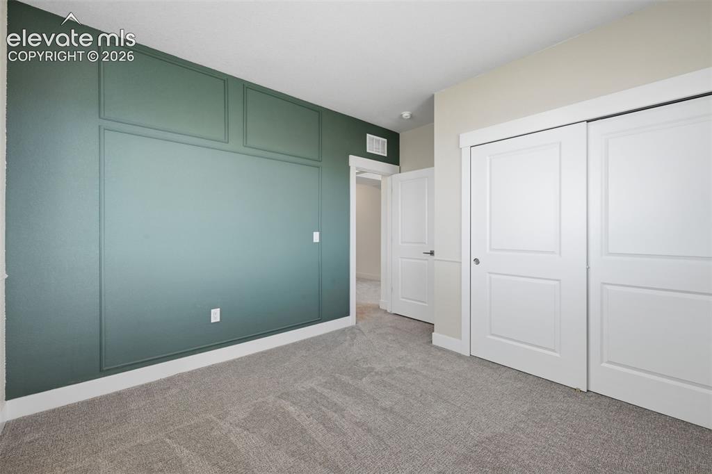 Image 36 of 44: basement bedroom