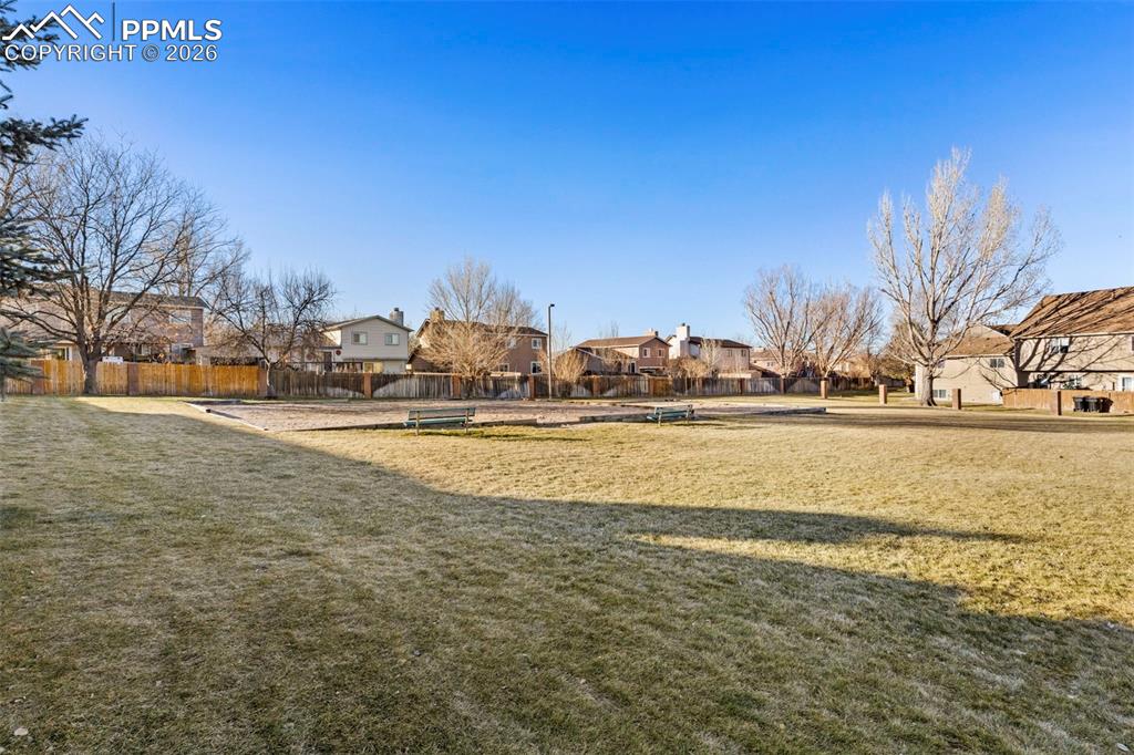 Image 23 of 26: View of open/green space with a residential view