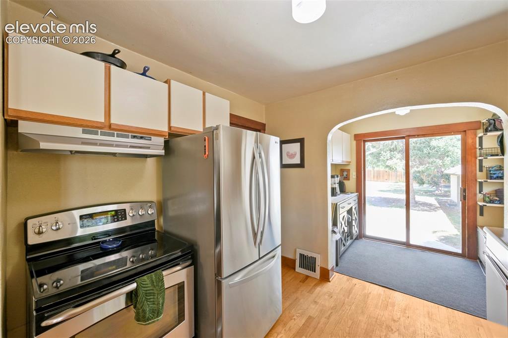 Image 11 of 36: Stainless, spacious, pantry, and character with a niche area for flexie use