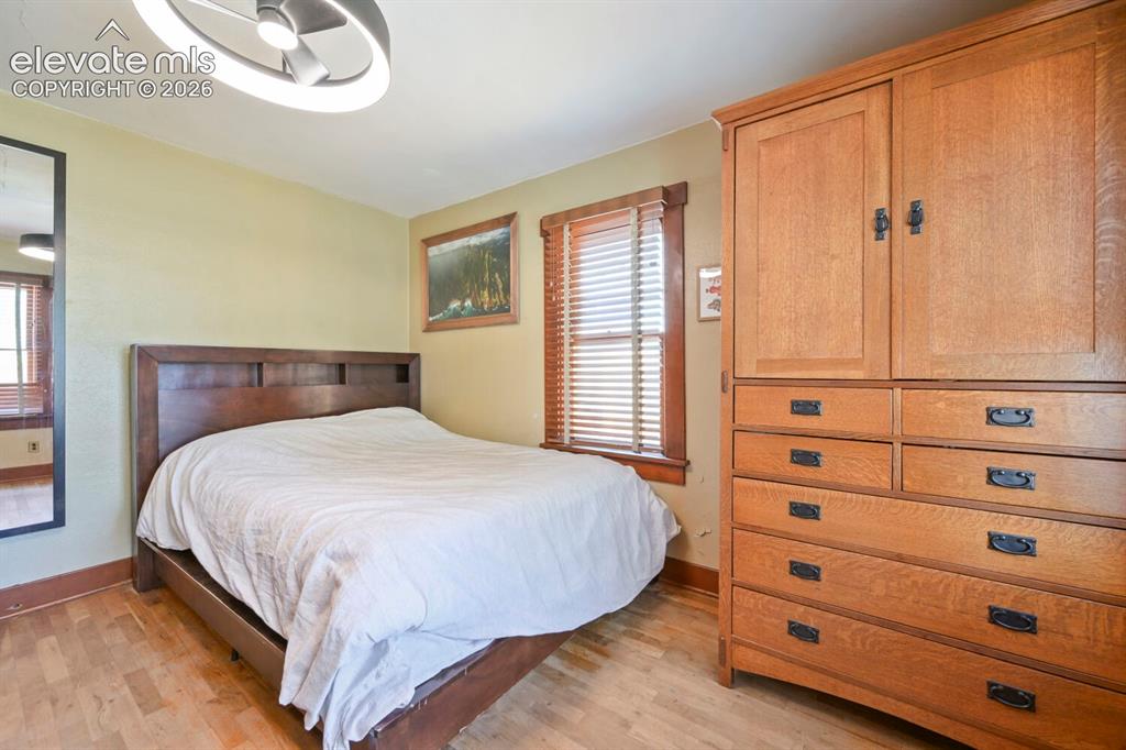 Image 12 of 36: Primary bedroom in the back of the home, great morning sunrise light!