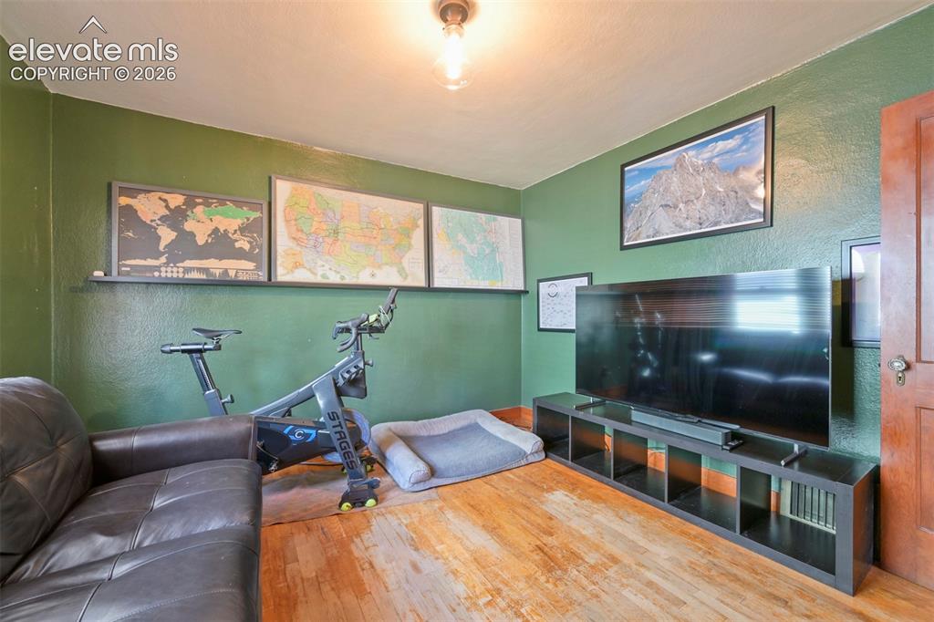 Image 17 of 36: A look again at this spacious bedroom being utilized as a den!