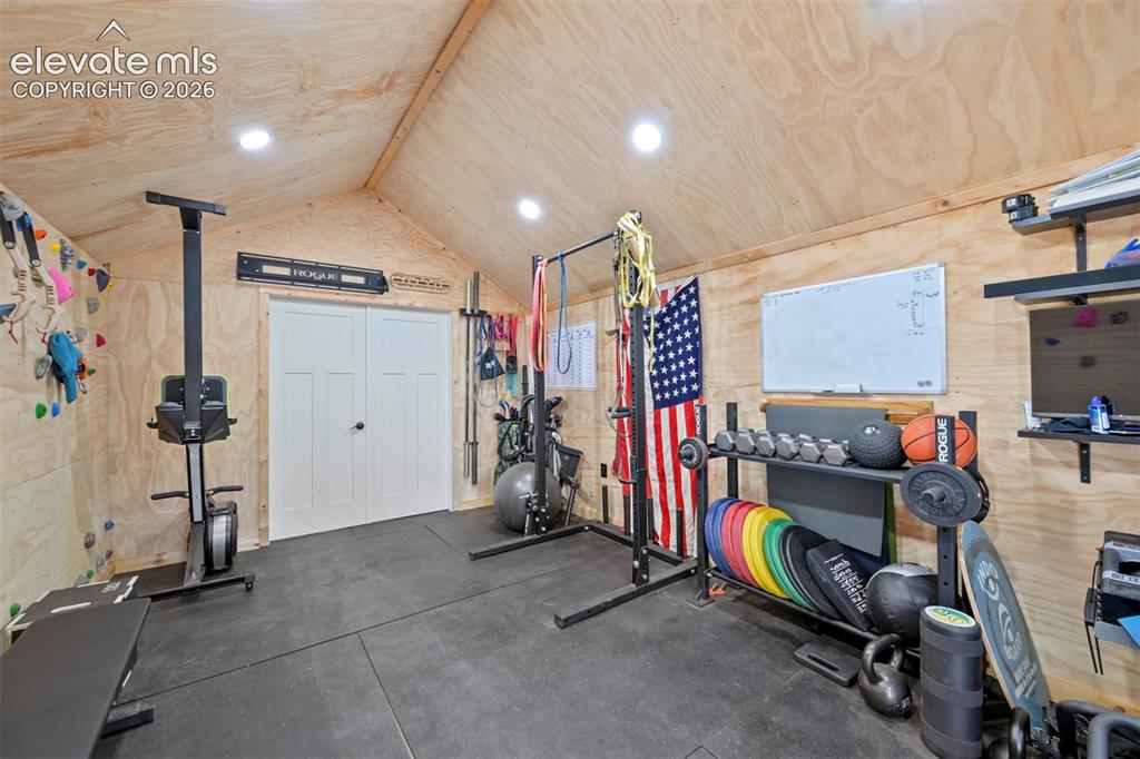 Image 27 of 36: The repurposed gym portion of the garage space!