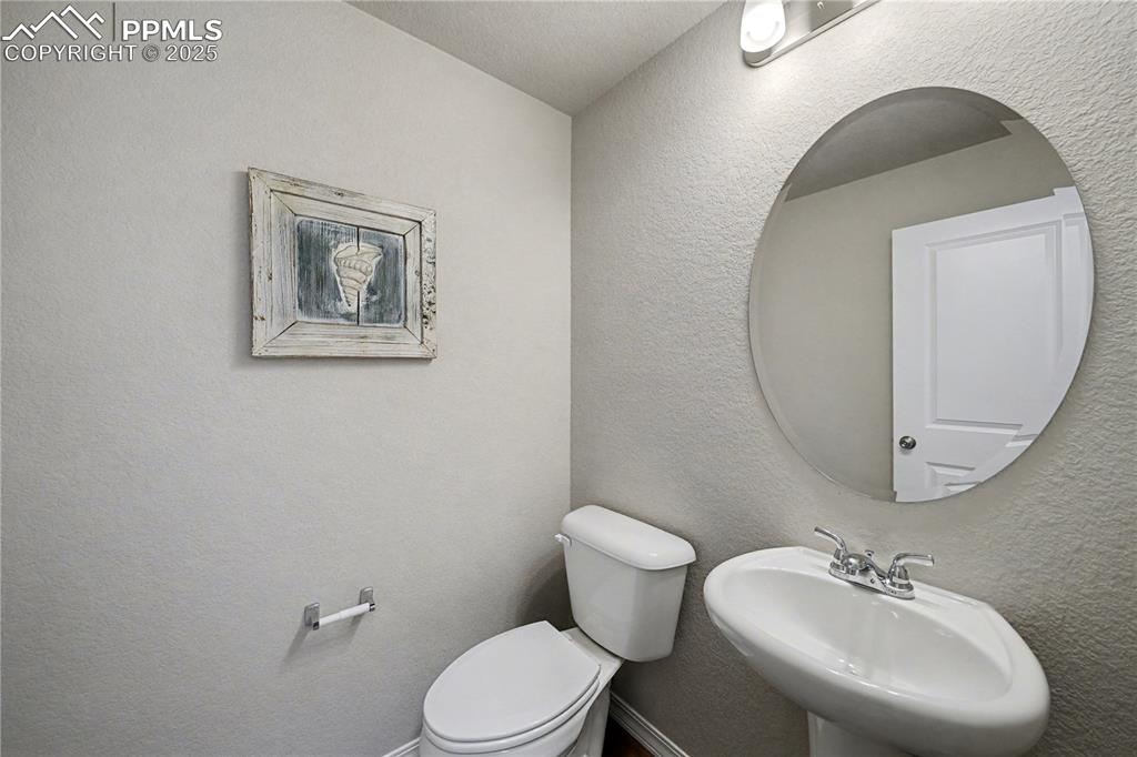 Image 14 of 38: Half Bath on Main Level