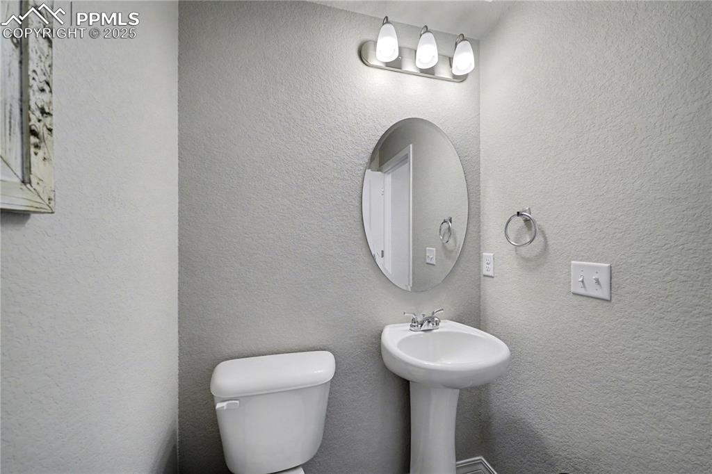 Image 15 of 38: Half Bath on Main Level