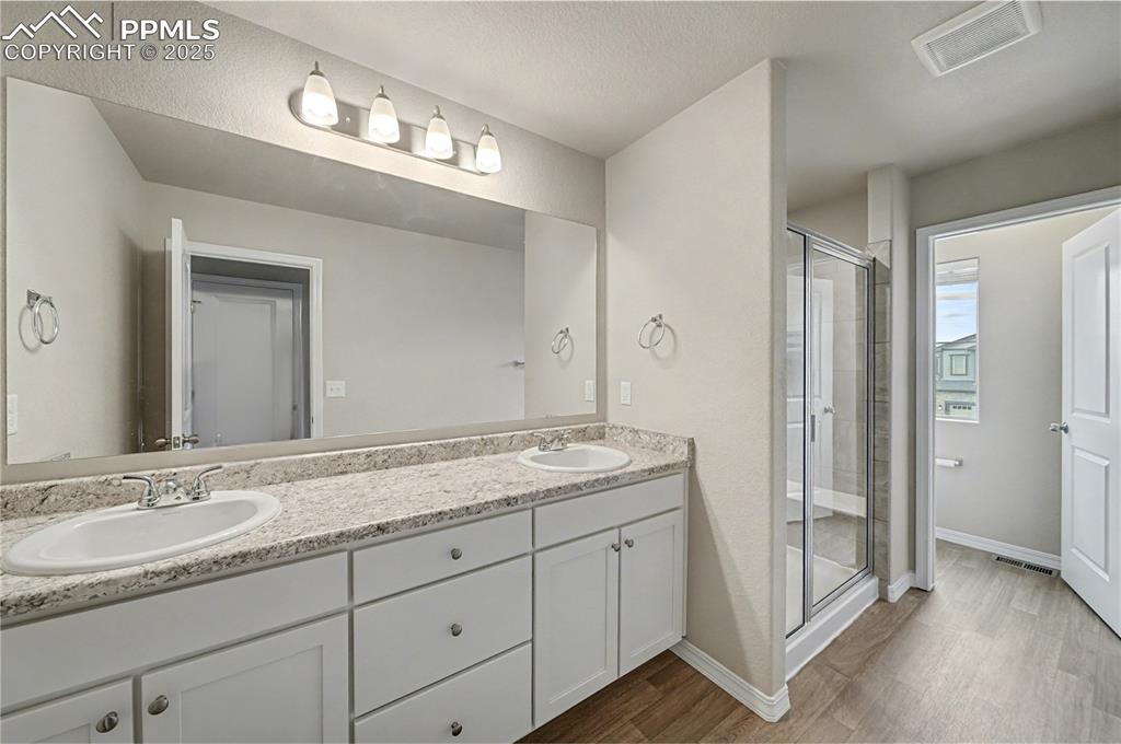 Image 19 of 38: Primary Bath with Dual Vanity