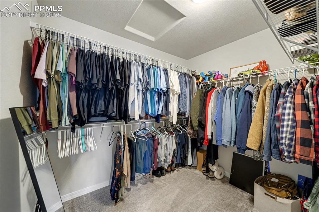 Image 22 of 38: Huge Primary Closet