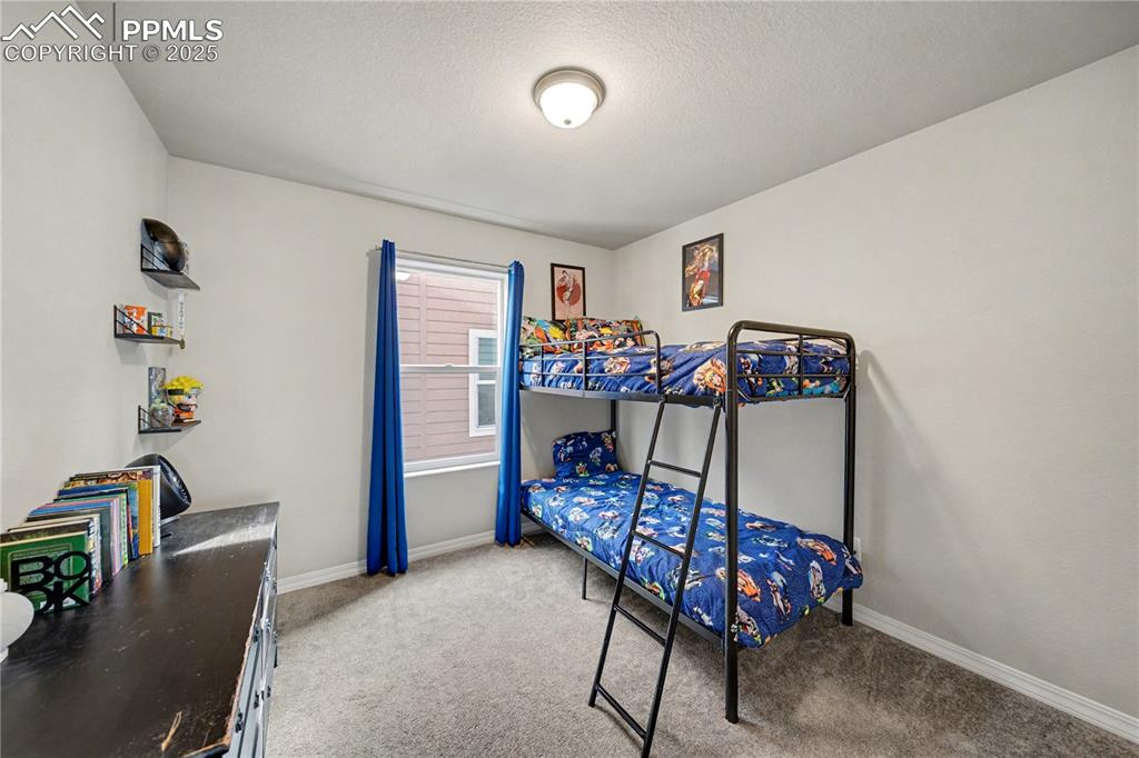 Image 25 of 38: Upstairs Bedroom 2