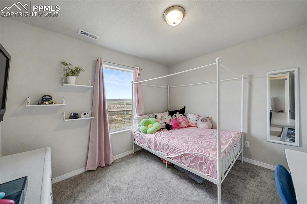 Image 28 of 38: Bedroom