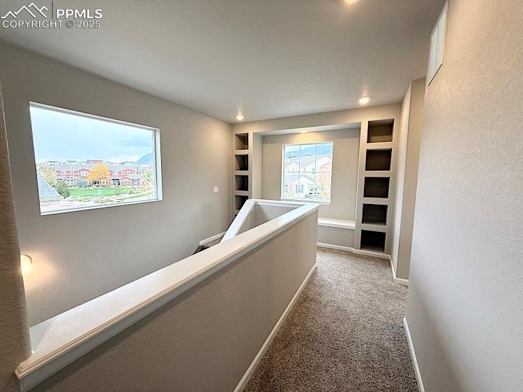 Image 21 of 49: Upper Level Hallway.