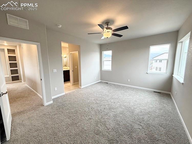 Image 24 of 49: The Primary suite comes with a luxurious bathroom and a spacious walk-in cl