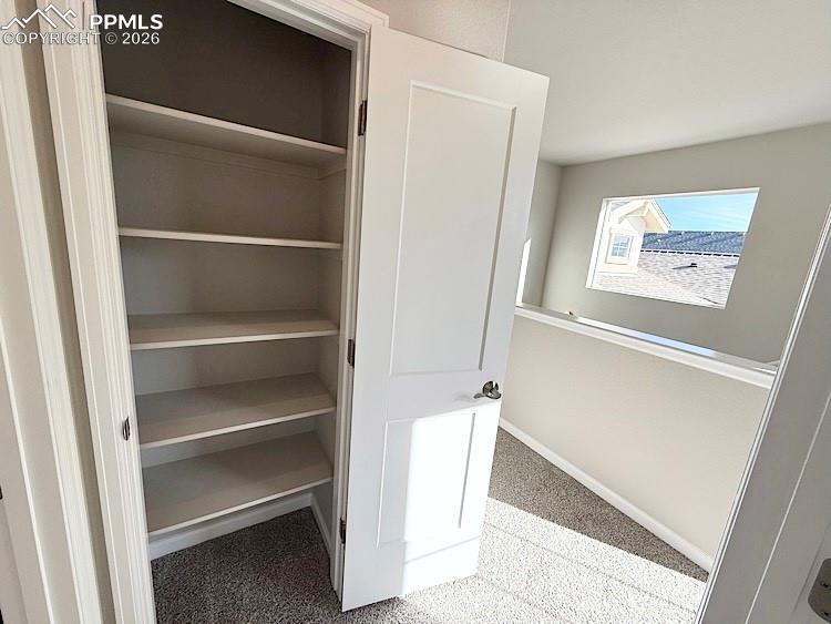 Image 34 of 49: A roomy Linen Closet conveniently located next to the Third Bedroom and Ful