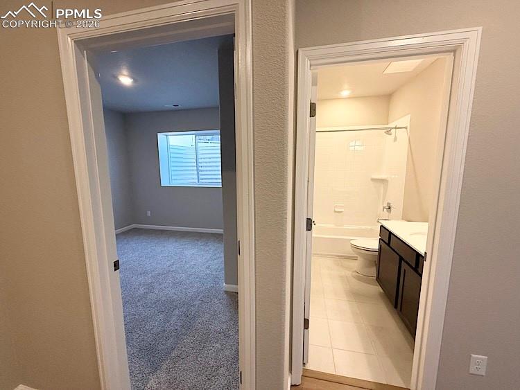 Image 38 of 49: The Lower Level Bedroom and Full Bathroom are conveniently situated right n