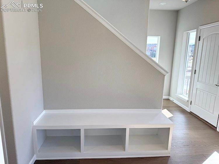 Image 4 of 49: Fantastic boot bench and drop zone in the entryway!