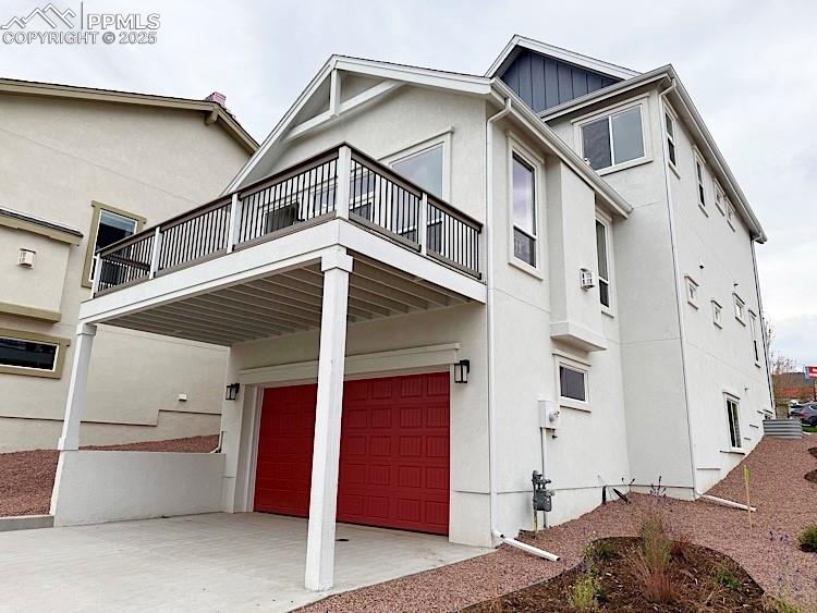 Image 42 of 49: 2 Car Tuck Under Alley Garage!