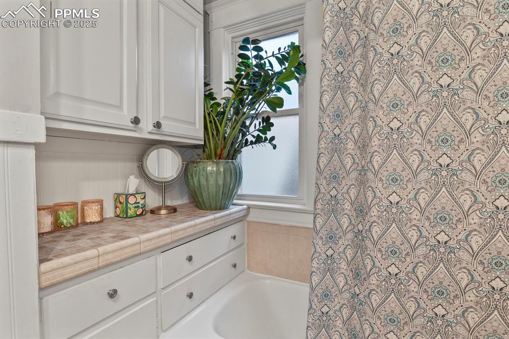 Image 16 of 36: Full bath with a bath