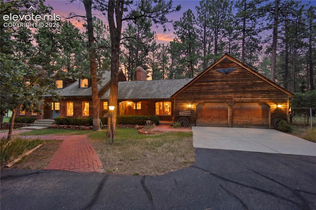 Caption: This twilight view showcases the home