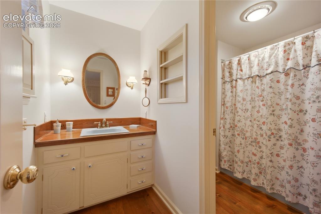 Image 32 of 50: An additional spacious upstairs bedroom provides a perfect, quiet retreat f