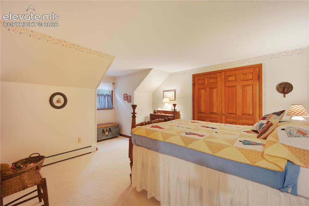 Image 33 of 50: This upstairs jack & jill bathroom maintains its classic charm and features