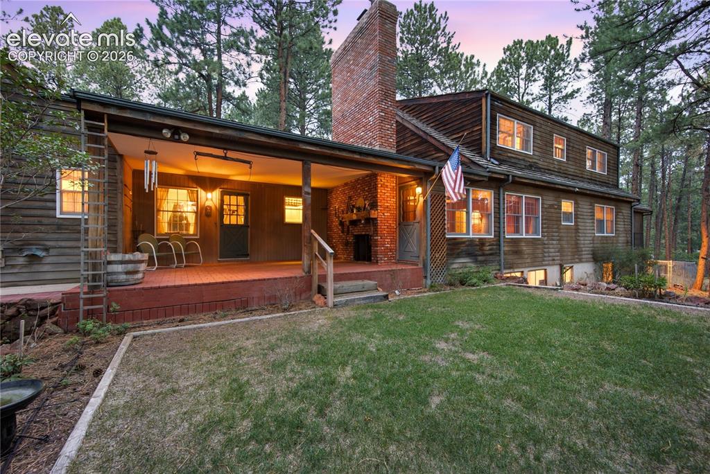 Image 46 of 50: The rear exterior highlights the home