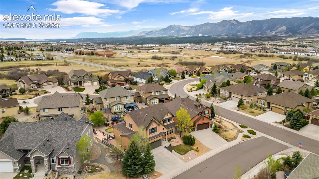 Image 46 of 50: Residential neighborhood featuring diverse architectural styles and mature 